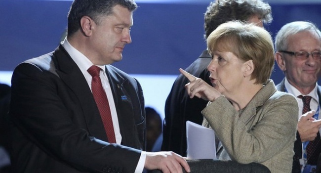 Политолог объяснил, для чего Меркель приезжала в Киев